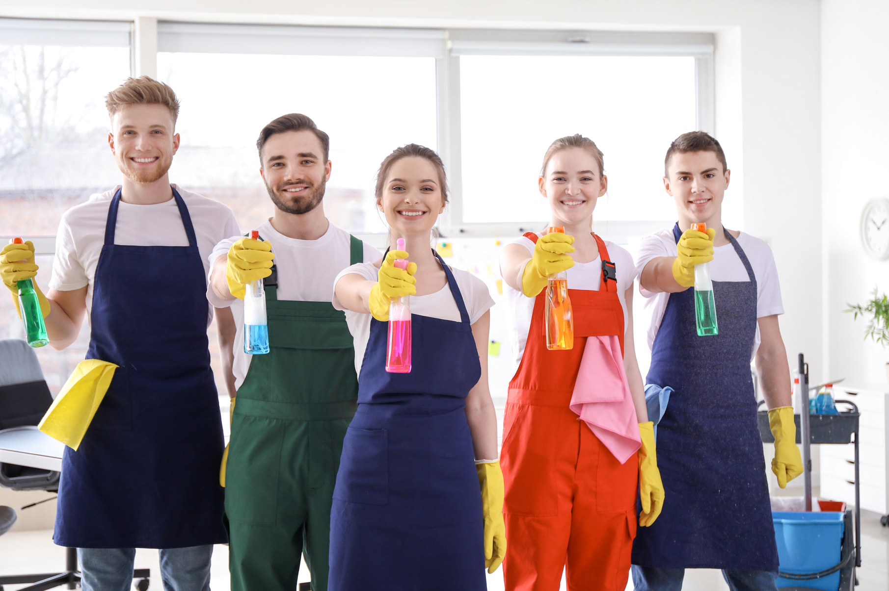Portrait of Janitors Cleaning Office